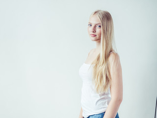 Blonde woman with long smooth hair natural portrait