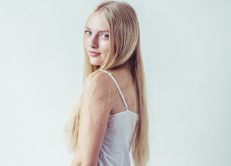 Beautiful blonde woman natural portrait with long blonde smooth hair