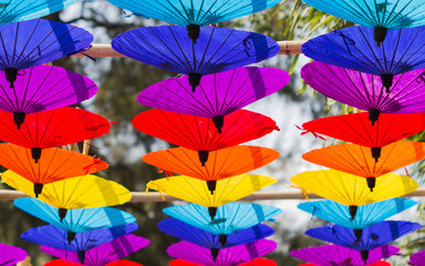 Fototapeta na wymiar Colorful Umbrellas Floating