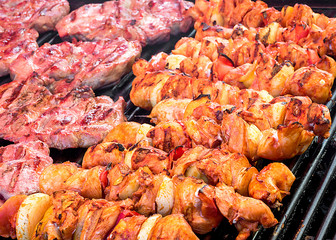 Skewers on grill, barbecue, traditional holidays, celebrating weekends