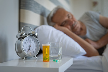 Man sleeping with medicines