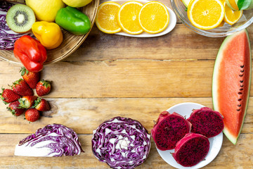top view mixed vegetables healthy diet food on wood table background textures , copy space