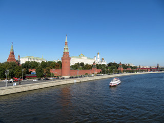 View of the Moscow river and Moscow Kremlin in autumn, clear blue sky background. Beautiful city panorama, russian tourist landmark