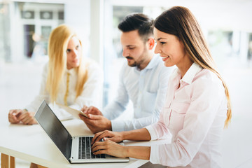 Business colleagues working together at office