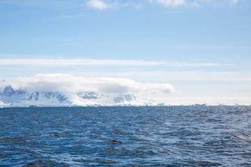 ice in the Antarctica with iceberg in the ocean