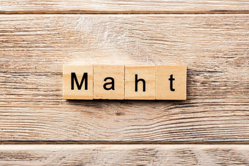 math word written on wood block. math text on table, concept
