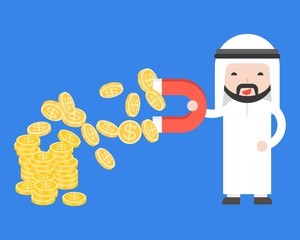Cute Arab businessman use magnet attraction gold coins , business situation strategy concept