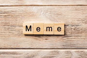 meme word written on wood block. meme text on table, concept