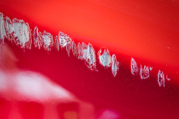 Close up Car scratch abrasive red color
