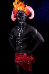 Fiery demon. A burning demon with horns