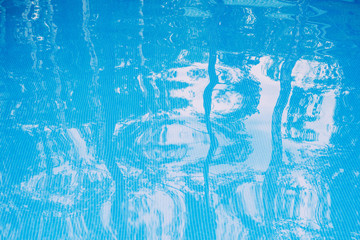 Fototapeta na wymiar swimming pool bottom caustics ripple and flow with waves background