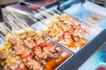 BBQ pork in street food market in thailand.