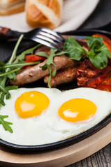 Fototapeta na wymiar breakfast with eggs and sausage