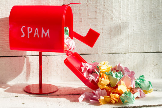 Full red mailbox of spam problem abstract on white background
