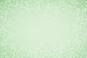 Green Christmas background with snowflakes 