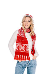 beautiful happy young woman in scarf and hat smiling at camera isolated on white