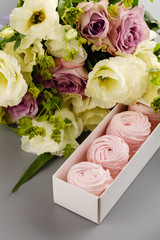 Set of handmade pink zephyr or marshmallow in white box with flowers