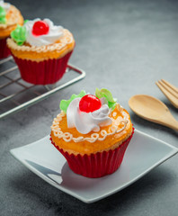 Cup cake on modern background.