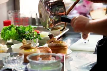 Chef preparing food, meal, in the kitchen, chef cooking, Chef decorating dish, closeup
