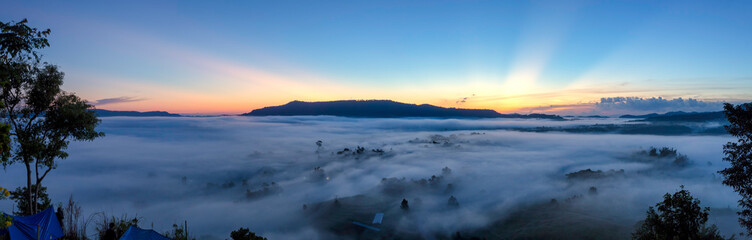 Fototapeta na wymiar Aerial view panorama landscape blue sky sunrise foggy in mountains of Khao Kho Thailand and landmark for watching mist on morning time.