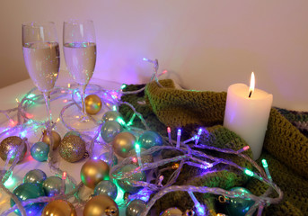 picture for the postcard. photo of the new year. New Year's still-life. Christmas Holidays. glasses of champagne and lights. New Year and Christmas 