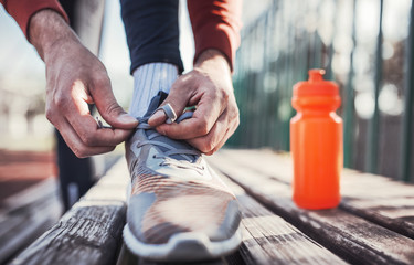Tying sports shoes. Sport, exercise, fitness, workout