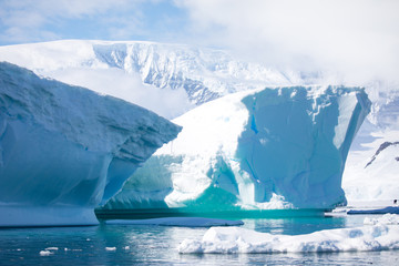 ice in the Antarctica with iceberg in the ocean