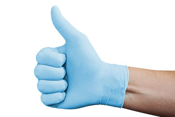 Hand in blue medical glove showing approval thumbs up sign isolated on white background