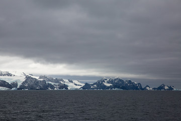 ice in the Antarctica with iceberg in the ocean