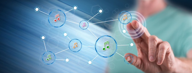 Man touching a music sharing network