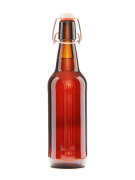 Brown Beer Bottle with cork on a white background with Copy space