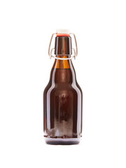 Small Brown Beer Bottle with cork on a white background with Copy space