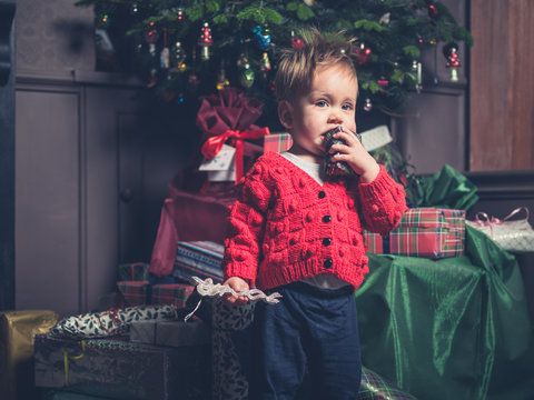 Little boy with christmas presents