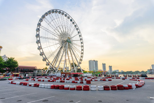 
Ferris wheel at amusement park in sunset time
