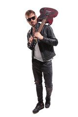 Naklejka premium fashion man with guitar on shoulder walking while holding collar