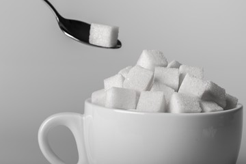 Cup and Spoon with Sugar Cubes