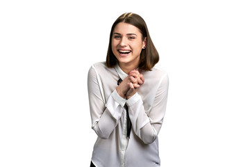 Joyful woman isolated on white background. Cheerful lady wearing elegant blouse is laughing. Female expression of happiness.