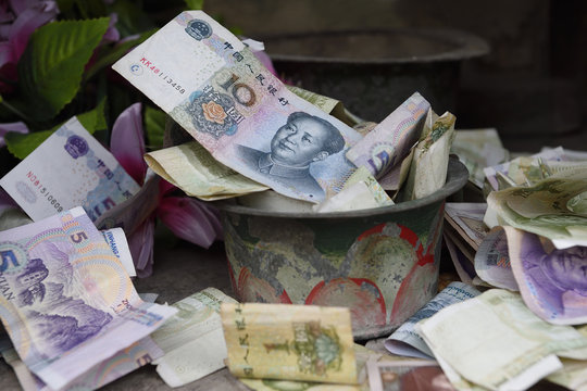 Money offerings temple china