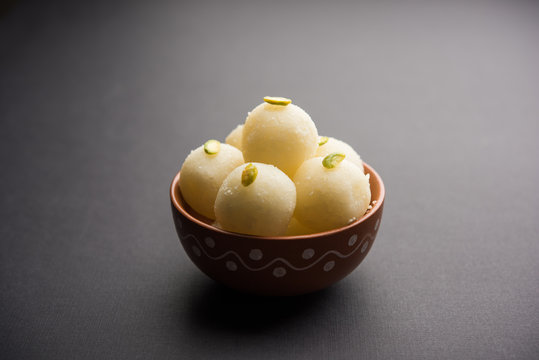 Indian Rasgulla or dry Rosogulla dessert/sweet served in a bowl. selective focus