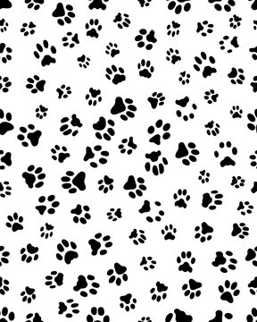 Seamless prints of paws of dog on a white background