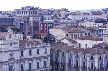 Obraz premium Catania rooftops and cityscape at sunrise in the background, Sicily, Italy