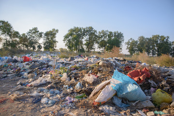 Garbage dump on a natural background