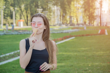 Fototapeta premium beautiful young woman in park