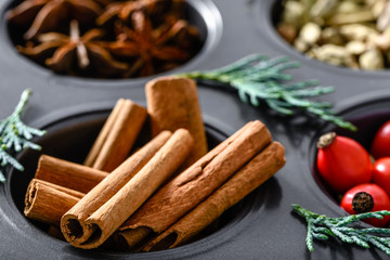 Cinnamon sticks. Christmas spice for baking, ingredients in a form.