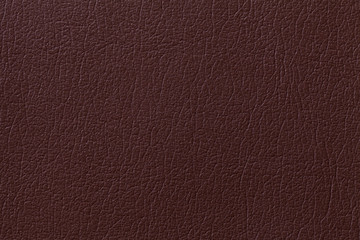 Dark brown leather texture background with pattern, closeup