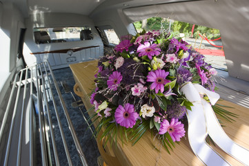 Coffin in funeral car
