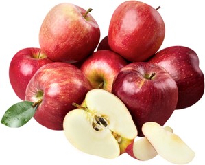 Pile of apples with one apple cut in half in front