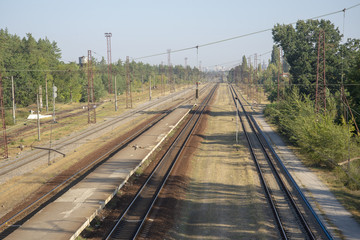Fototapeta na wymiar railway in the forest view from abobe