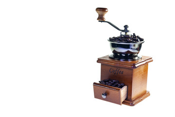 Vintage coffee grinder on a white background.