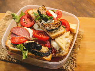 sandwiches in plastic portable box for food. fast food.